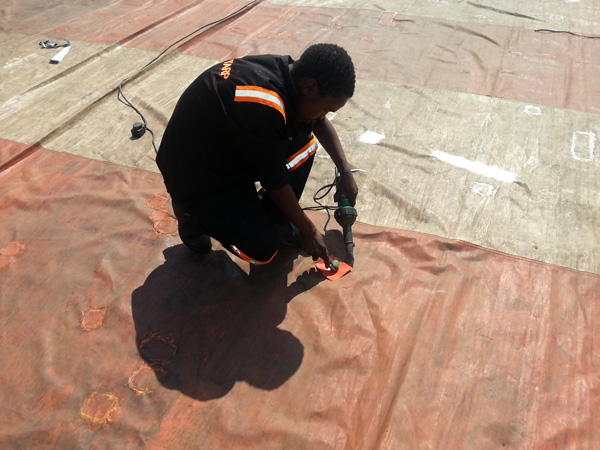 Tarp-Repairs-1